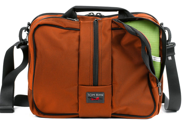 Pilot in Burnt Orange Ballistic with Moss (green with light green grid) 210 Cerylon interior.